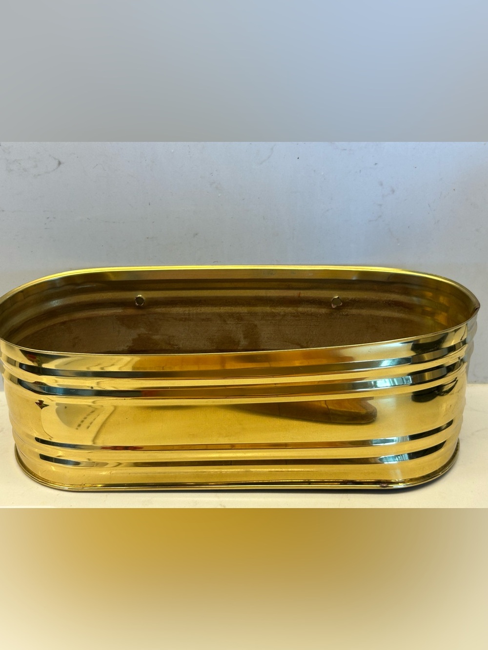 Vintage, lacquered solid brass planter manufactured in the USA.